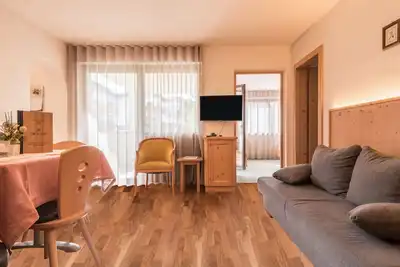 Image de Appartement \"Trocker Kastelrut 7\" près de Seiser Alm avec balcon, bain à remous et sauna