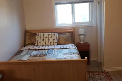 Image de bedroom suite with balcony freshly renovated in the heart of Sudbury.