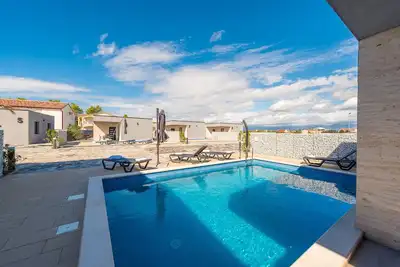 Image de Villa with pool for 4-6 pers in a luxury resort