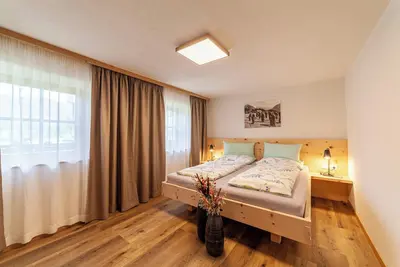 Image de Appartement \"Familienwohnung\" à \"Schildhof Ebion\" avec vue sur les montagnes, Wi-Fi et jardin