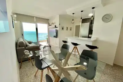 Nice apartment on the beach with a large terrace facing the sea