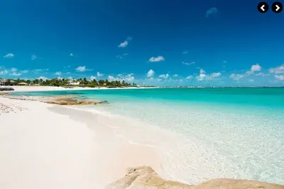 Image de New Listing 60 Second Walk  to Grace Bay Beach! 1br, Lush Gardens! ! New Villa! !