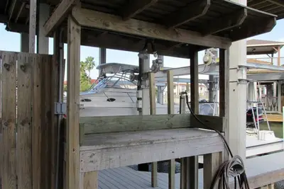 Red Fish Condo B, with boat slips and pool.