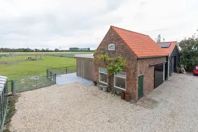 Image de Emplacement merveilleusement calme dans le polder, animaux acceptés, à proximité de la plage