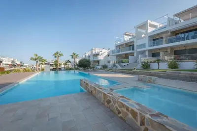 Image de Cosy 3 Bedrooms Apartment in Punta Prima ♡ Voir le calendrier