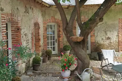 Image de Gite avec terrasse pavée ombragée