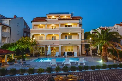 Image de Deluxe Two bedroom Apartment with Pool next to the Sea