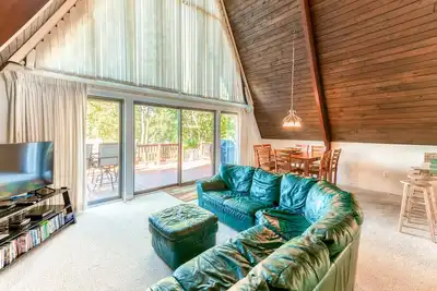 Image de Charming, lakefront A-frame with private dock, lakeside gazebo, spacious deck