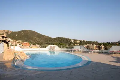 Image de Appartement \"Sobìa Pitticca\" près de la plage avec vue sur la mer, piscine, terrasse et jardin