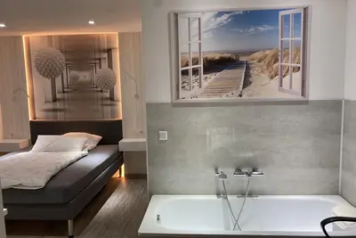 Image de Appartement-Supérieure-Salle de bain privée-Vue sur Jardin-Zimmer 102