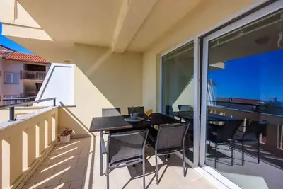 Image de Appartement de vacances avec air conditionné et vue sur la mer