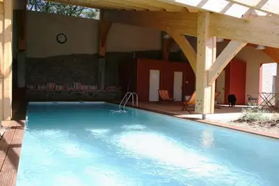Image de Le Jardin dans le Chêne Duplex 140 m2 4 à 8 pers. Piscine chauffée. Wifi