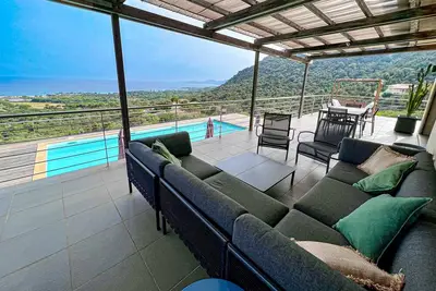 Image de Vue mer panoramique 5 chambres piscine chauffée Palombaggia