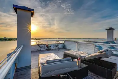 Image de Emmas Home - 1st row by the water, sauna, roof terrace, beach chair, 2 parking spaces