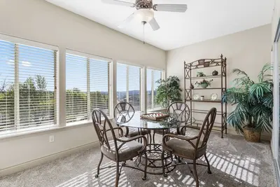 Image de 1 King Bedroom Golf Condo with All-Season Sunroom - Beautiful View!