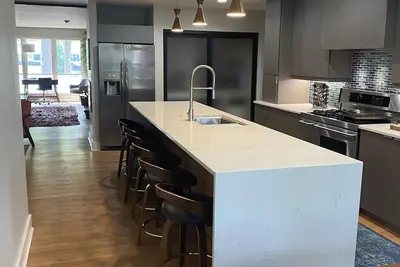 Image de Newly Renovated 4-bedroom modern home -less than 2 miles from Augusta National