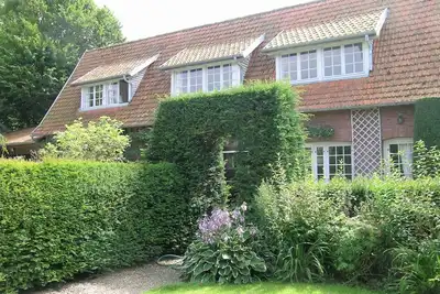 Image de Clos Normand, jolie maison dans un jardin exceptionnel