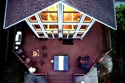 Image de Lakehome🏡🌊Big View 👀 Monster Deck ✌🏼Fire Pits🔥 Boat Dock 🚤 Loft Office 👨🏻‍💻 Kayaks 🚣🏼‍♀️