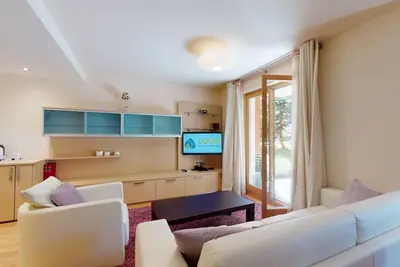 Image de Appartement moderne avec 3½ chambres, au rez-de-chaussée, d'environ 58m².