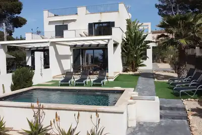 Image de \" Casa Penyes Iv \" Sea view, license, Wlan, saltwater pool with counter-current.