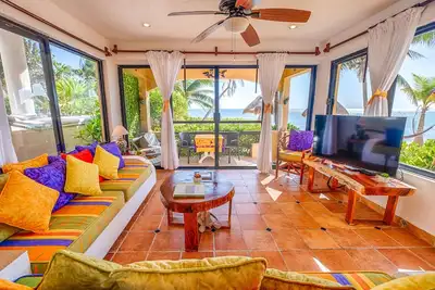 Image de Walk onto the white sandy beach of Half Moon Bay from your patio door!