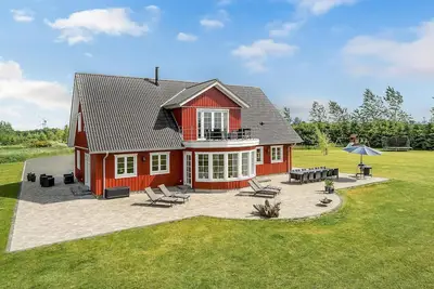 Image de Maison confortable de 6 chambres à.