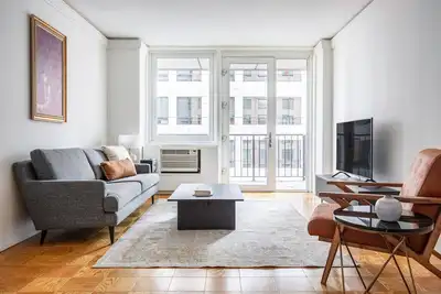 Image de Bright Midtown 2br w/ Gym, Doorman, walk to Central Park, by Blueground