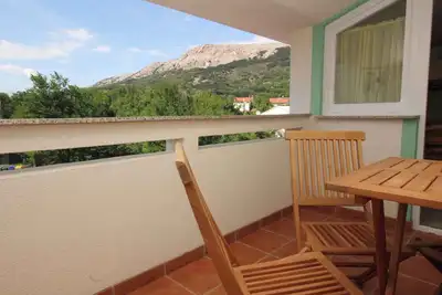 Image de Appartement de vacances avec balcon, air conditionné et internet
