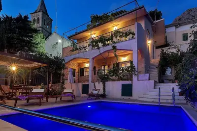 Image de Maison de vacances Podgora pour 1 - 8 personnes avec 3 chambres à coucher - Maison de vacances