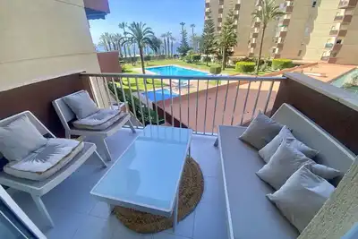 Image de New front line beach apartment with swimming pool, A/C and Wifi