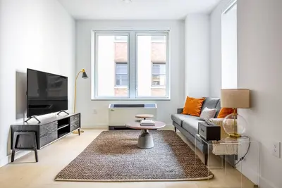 Image de Sleek FiDi 1br w\/ Gym, Doorman, W\/D, near Wall Street, by Blueground