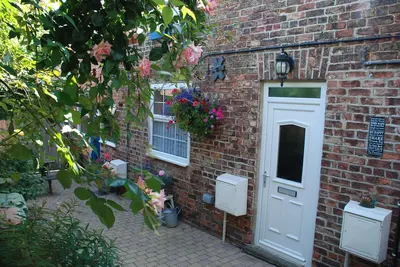 Image de Cottage-Supérieure-Salle de bain-Vue sur la cour