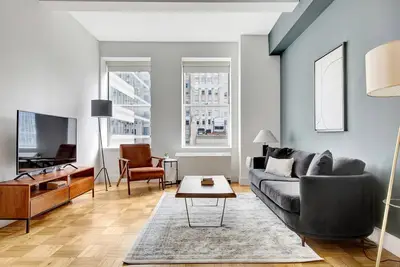 Image de Spunky Wall Street 1br w/Speakeasy, Doorman + Gym by Blueground