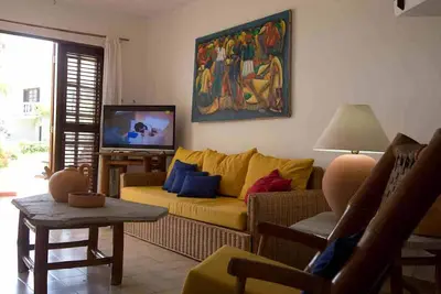 Image de 2-floor house on the sandy beach, with tennis court, pool, Bbq, cable Tv, Wi-Fi