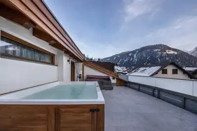 Image de Appartement \"Vacanze Arcobaleno - Giallo\" avec vue sur la montagne, sauna et bain Ă remous