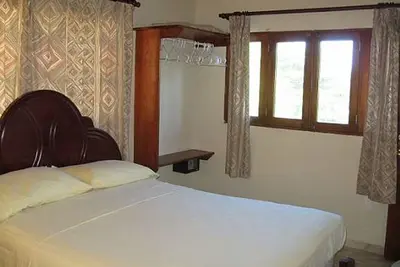 Image de Guesthouse room in downtown Cabarete, steps from beach, with pool, fast Wi-Fi