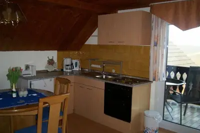 Image de Cozy attic apartment (55sqm) with eat-in kitchen and covered balcony