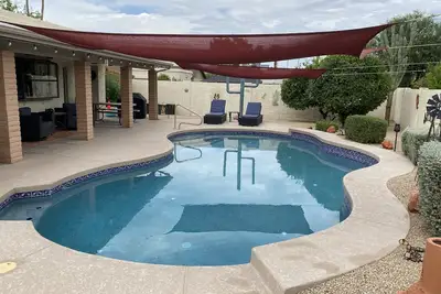 Image de Gorgeous corner home with a private pool.