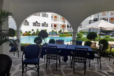 Image de 3bd luxury condo in gated resort near surfing beach, with pool/Ac/cable Tv/Wi-fi