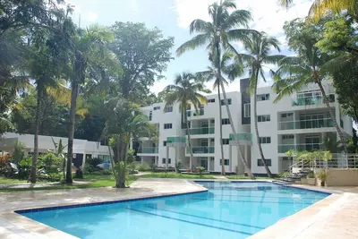 1-bedroom condo steps from sandy beach, gated resort with pool/cable Tv/Wi-Fi