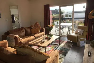 Image de Chalet Sundowner only 450 meters to the beach, garden with 1 m fence!