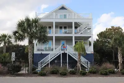Large second row beach home with private swimming pool located at North Litchfield Beach.