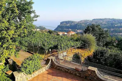 Casa Rosea: A characteristic two-story apartment that is part of a villa built sheer above the valley, with Free Wi-Fi.