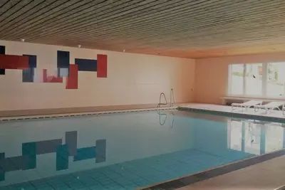 Image de Alpenveilchen apartment in the Oberallgäu with pool, sauna and great views from the balcony