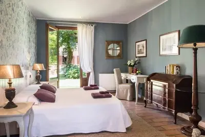 Image de Chambre double avec vue sur le jardin