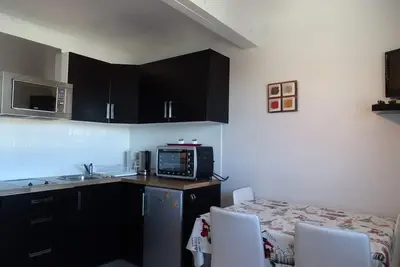 Image de Studio cosy 4 pers, ski aux pieds, casier à skis, parkings gratuits, équipement complet inclus.