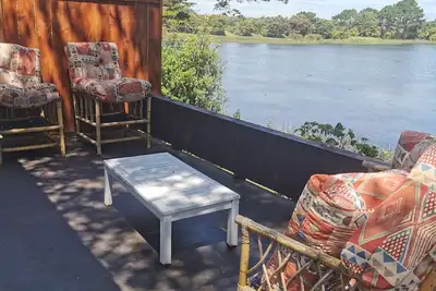 Image de With the lake on your doorstep, Beach 2 minutes away and river swimming hole.