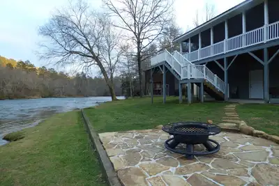 Image de Winter in the mountains, fishing by the fire pit. Murphy and the Casino nearby.