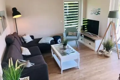 Möwennest N°4 - Ground floor apartment with sauna, sun terrace and garden.