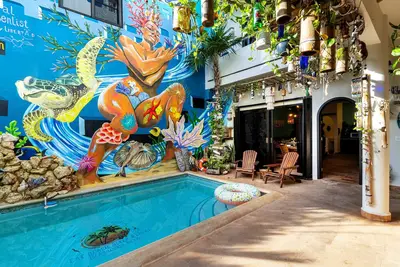 Image de The Jardin Suite lower-level suite, poolside w/kitchen at Boutique Hotel